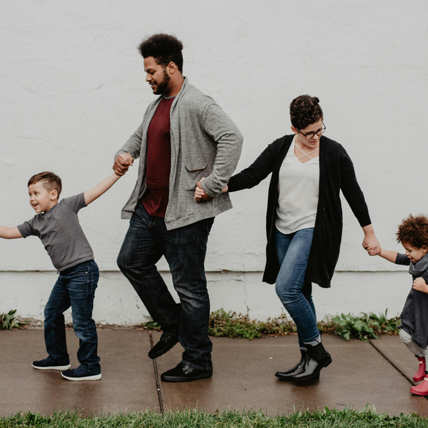 Family walking on the sidewalk